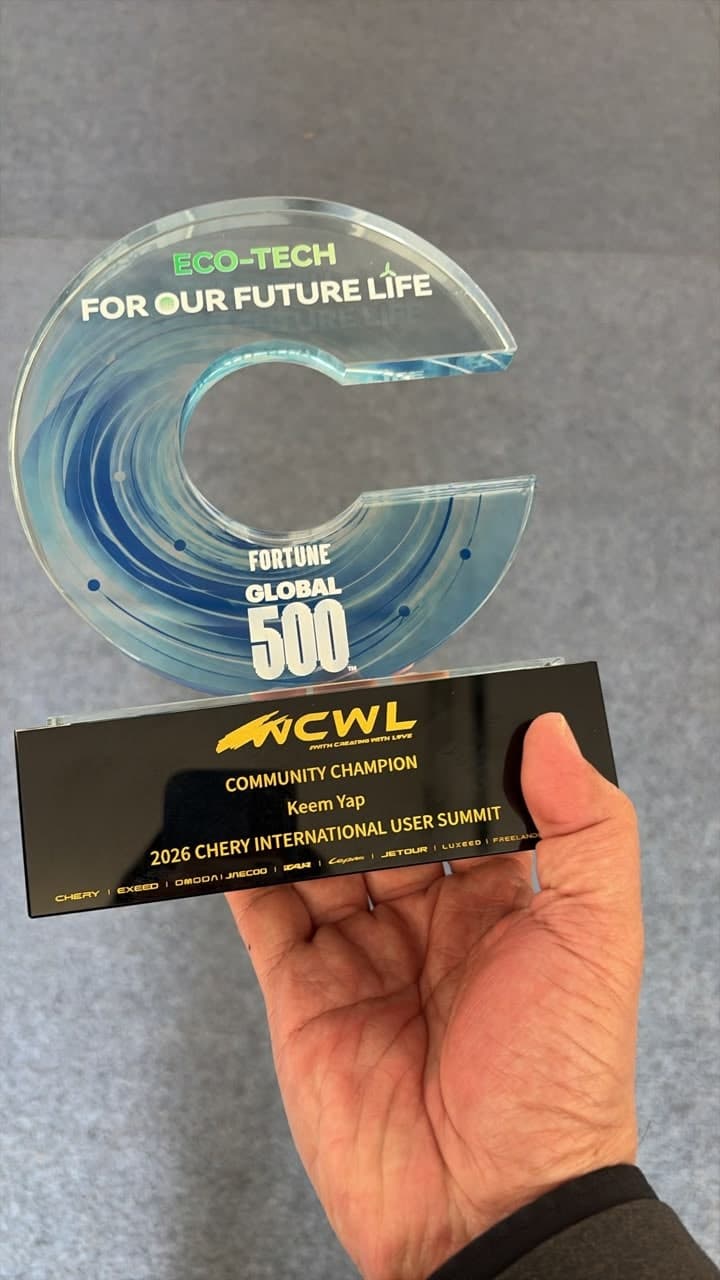 A Community Champion trophy with Keem Yap’s name and 2026 Chery International User Summit on the base.